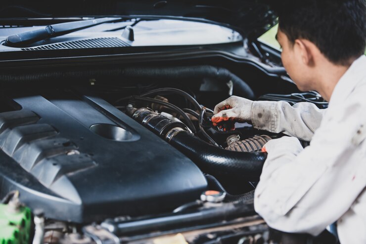 car-repairman-wearing-white-uniform-standing-holding-wrench-that-is-essential-tool-mechanic