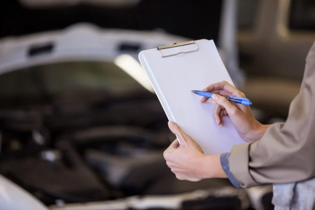 female-mechanic-preparing-check-list-scaled