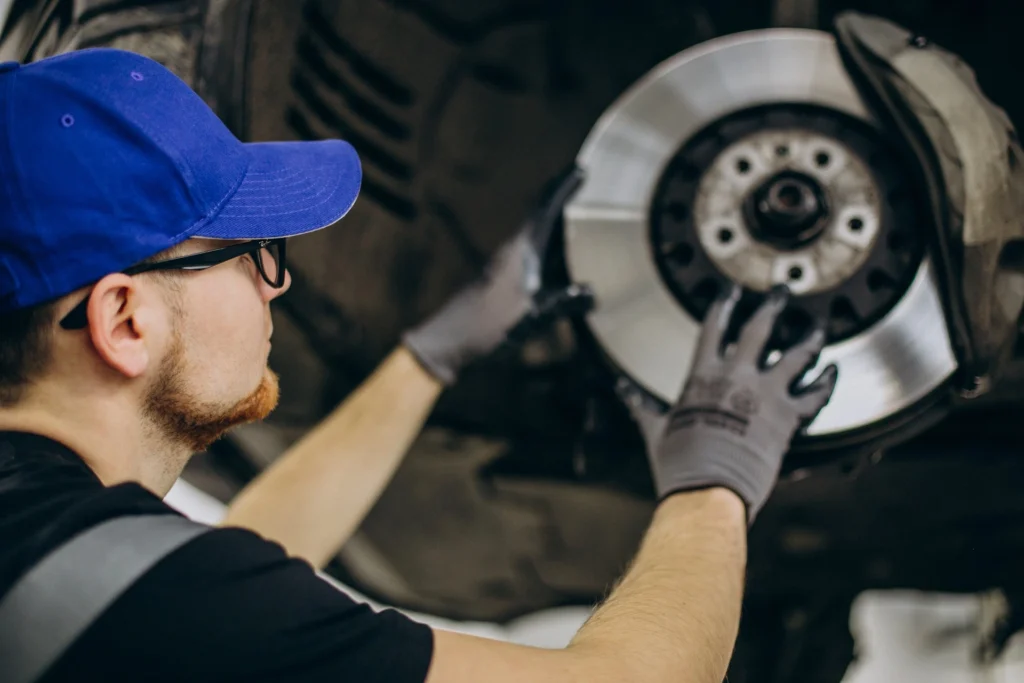 mechanic-changing-brake-discs-car-service