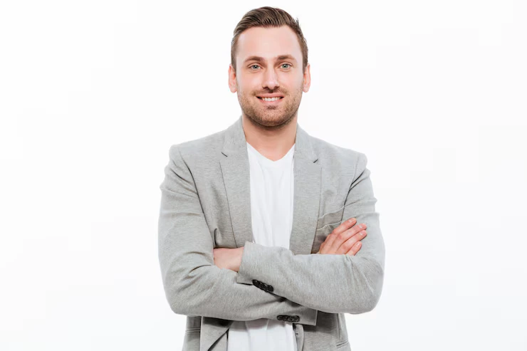 portrait-successful-man-having-stubble-posing-with-broad-smile-keeping-arms-folded_171337-1267