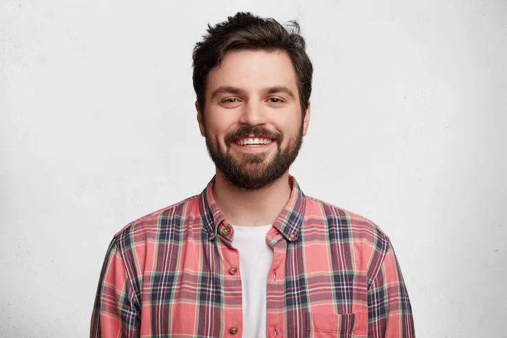 young-bearded-man-with-striped-shirt_273609-5677