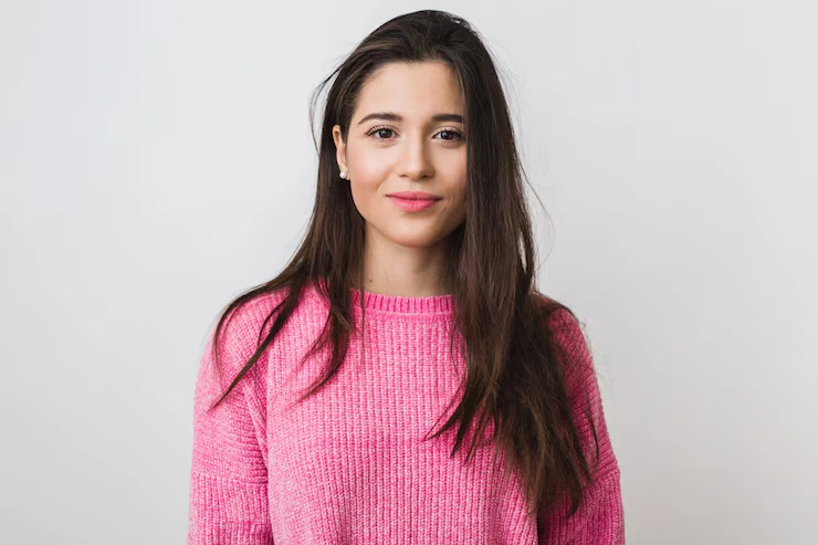 young-beautiful-woman-pink-warm-sweater-natural-look-smiling-portrait-isolated-long-hair_285396-896